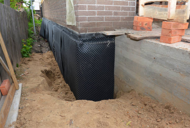 SJ Waterproofing Pros technician performing targeted Sump Pump Installation assessment in Dayton, OR